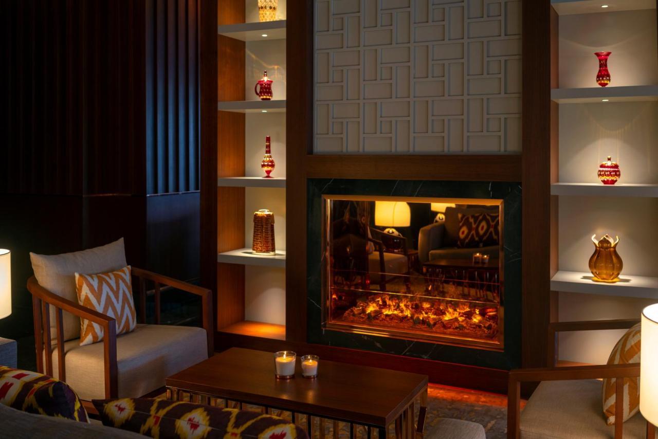 Moevenpick Hotel Istanbul Asia Airport Exteriér fotografie The fireplace at the lobby